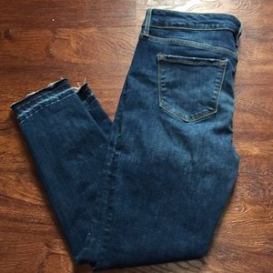Distressed ankle jeans